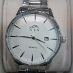 Men's stylish chronograph watch with black dial and stainless steel strap, perfect for formal and ca.