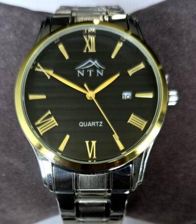 Quartz watch with black dial and gold accents, featuring date display and stainless steel strap.