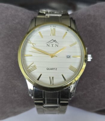 Men's quartz watch with white dial, gold accents, and stainless steel strap. Features date display a.