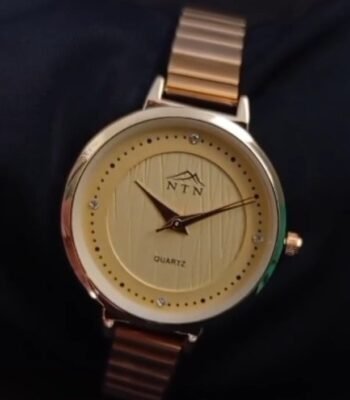 Elegant women's watch with a golden dial and steel strap. Perfect for stylish and professional looks.