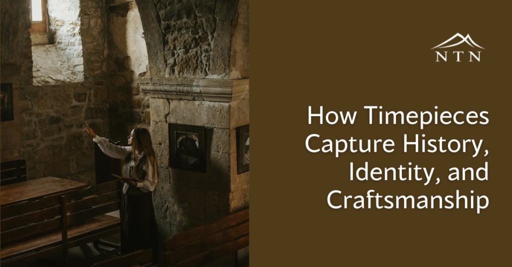 Historic room with woman pointing at art on stone wall.