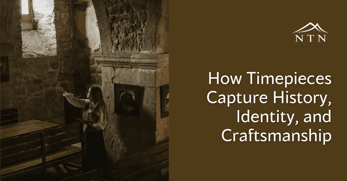 Historic room with woman pointing at art on stone wall.