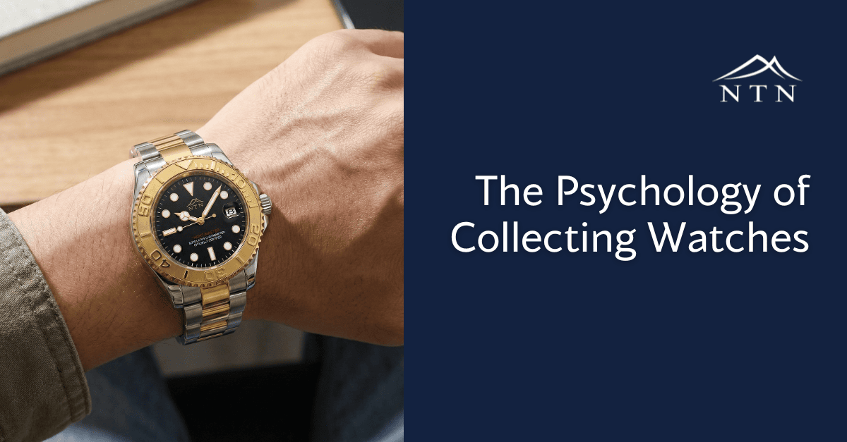 Luxury watch with gold and silver band on wrist.