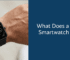 Smartwatch displaying health and fitness metrics on a person's wrist.