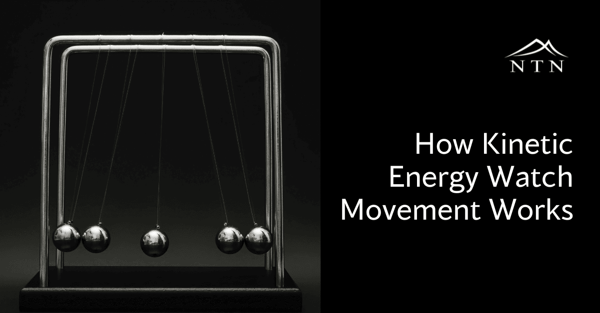 Close-up of a Newton's cradle demonstrating energy transfer.