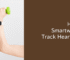 Smartwatch with heart rate monitor showing on wrist.