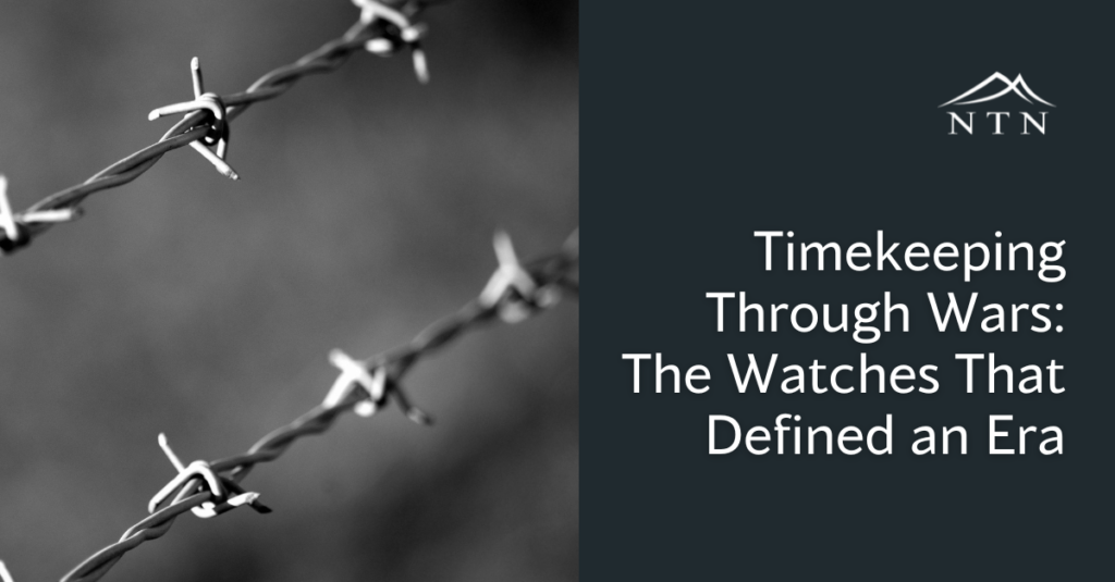 Close-up of barbed wire on dark background, emphasizing wartime surveillance and protection strategies.